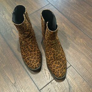 Leopard print boots.
